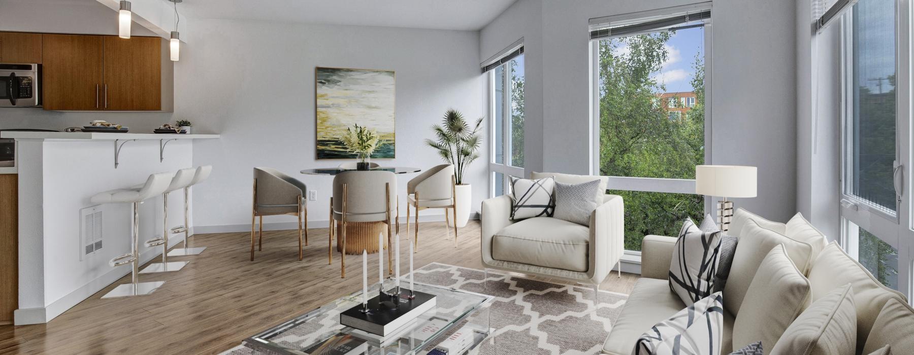 a living room with a table and chairs